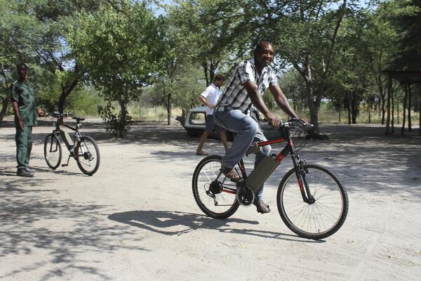 Wuparo conservancy manager riding the E-bike